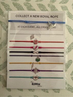 Silver Cruise Ship Charm Bracelet on Light Blue Braided Cord
